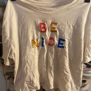 What “be nice” t-shirt.